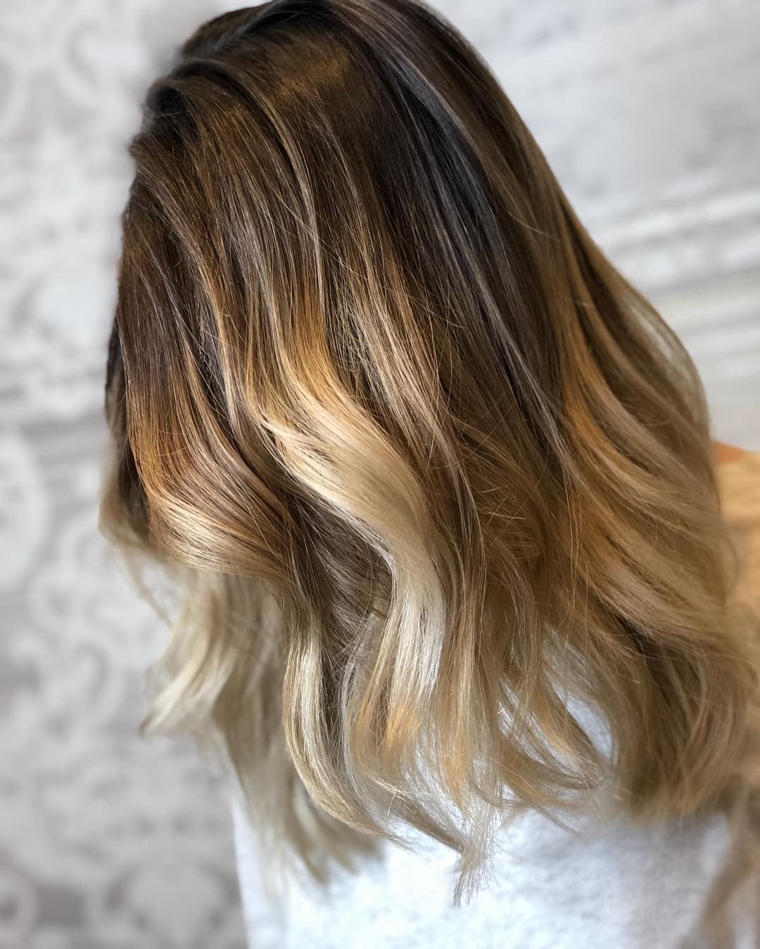 Blonde balayage highlights transformation NYC luxury salon
